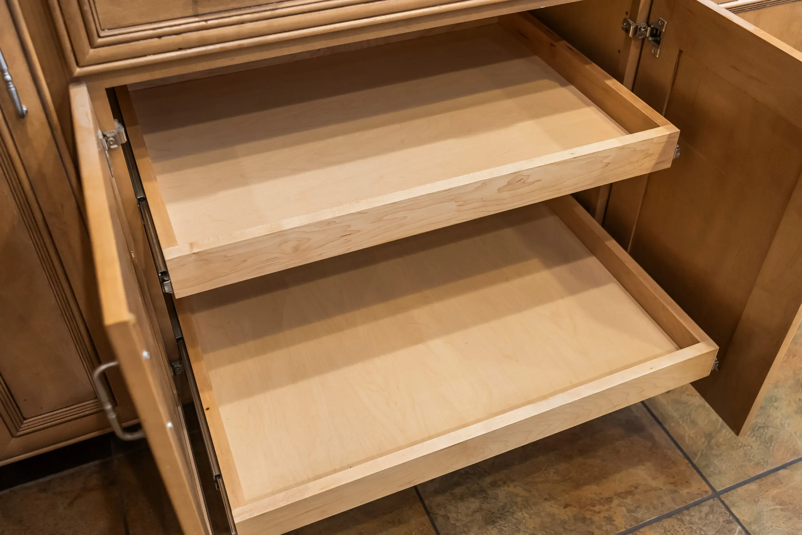 Open wooden cabinet with sliding shelves