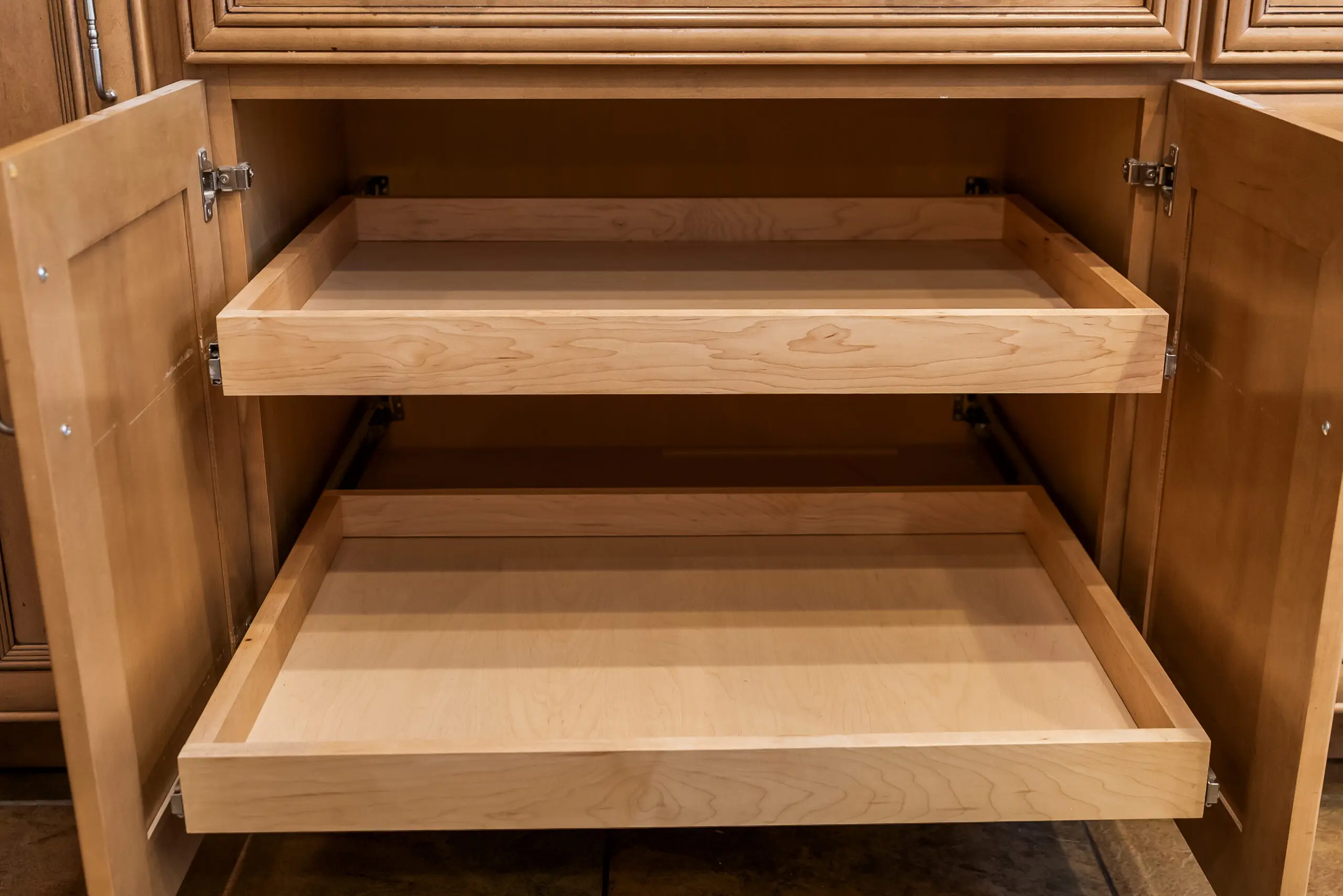 Empty kitchen cabinet drawers extended