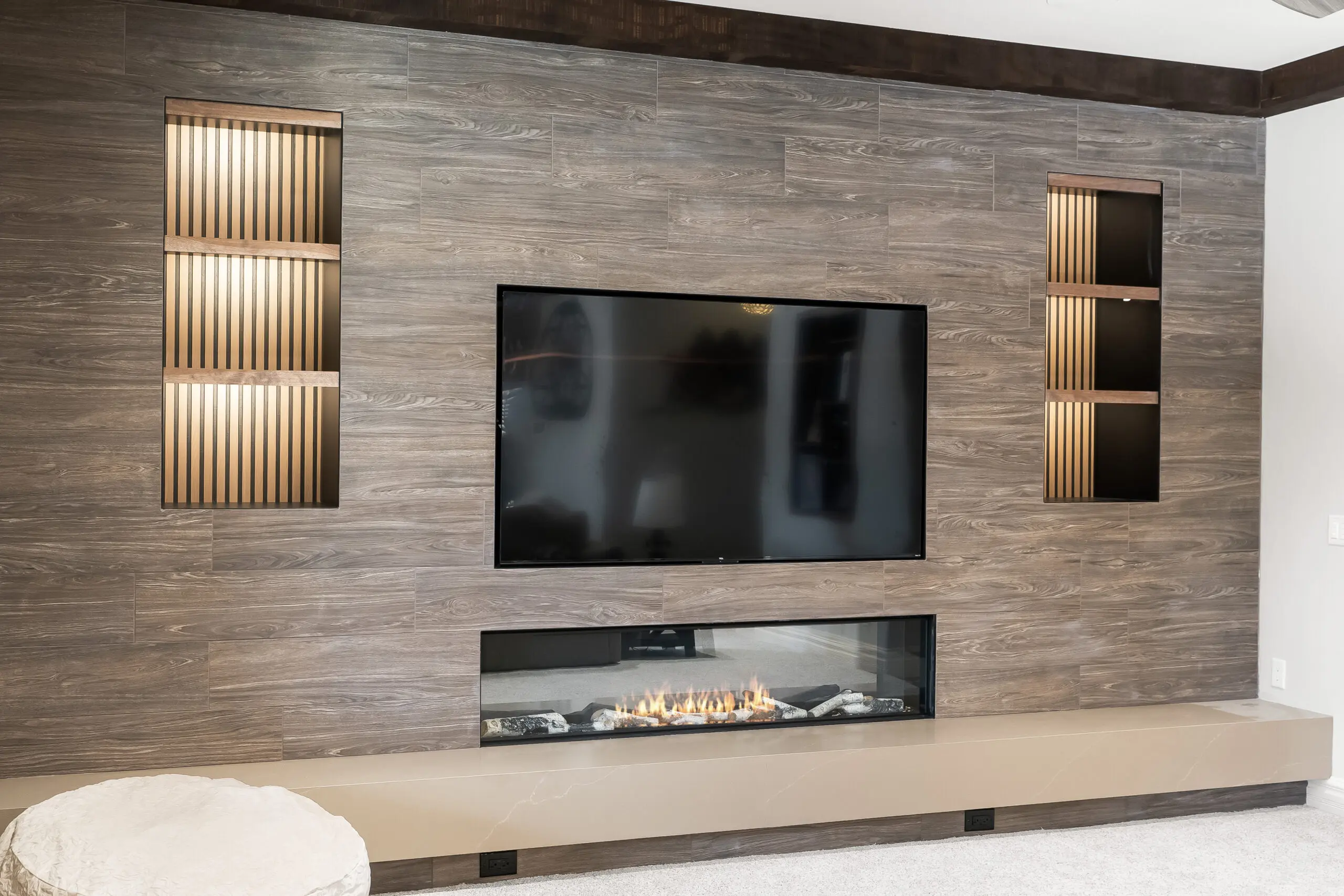 Contemporary media wall design with shelves