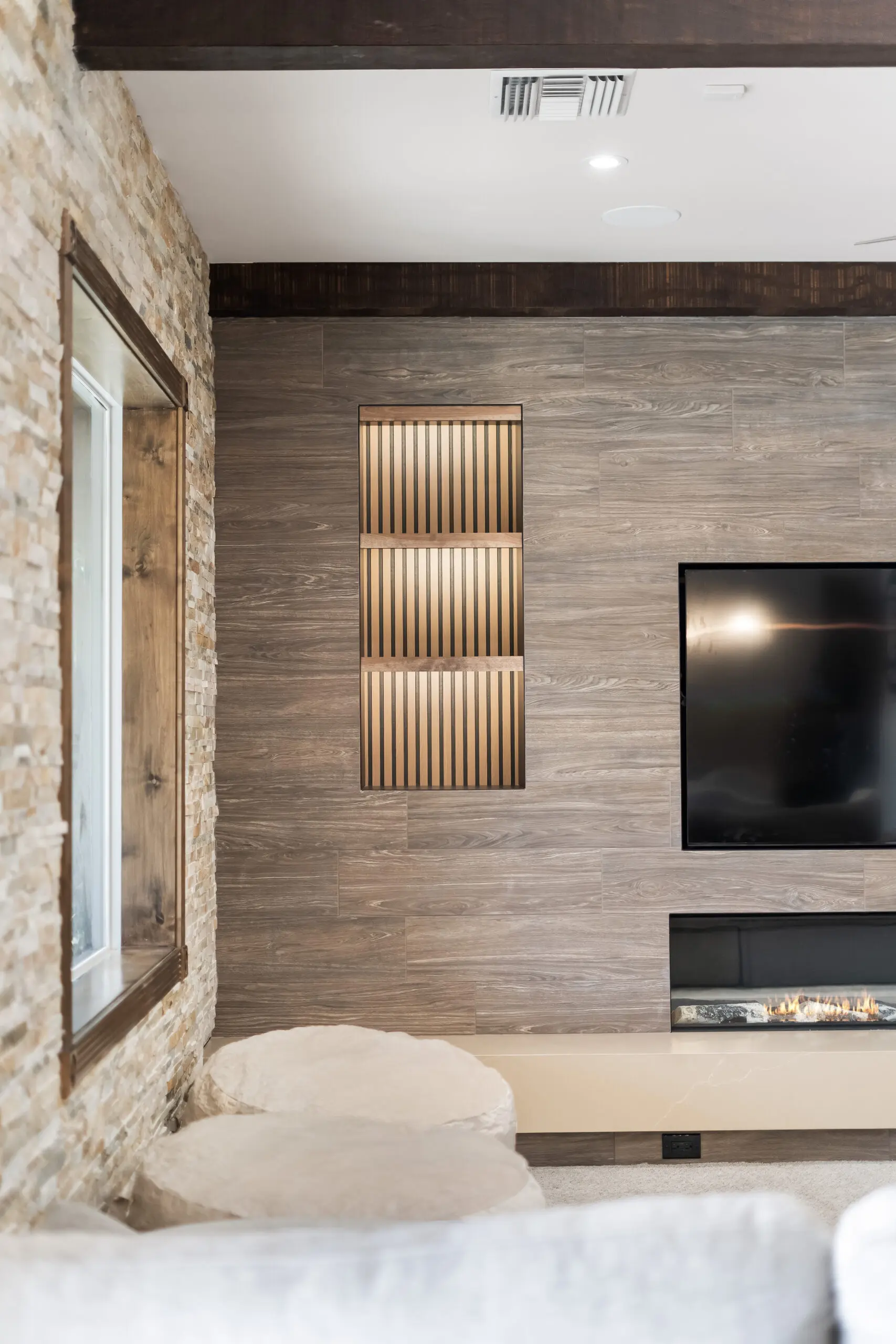 Cozy interior featuring large TV